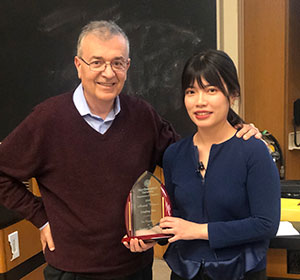 picture of professor kanatzidis presenting award to linling mao